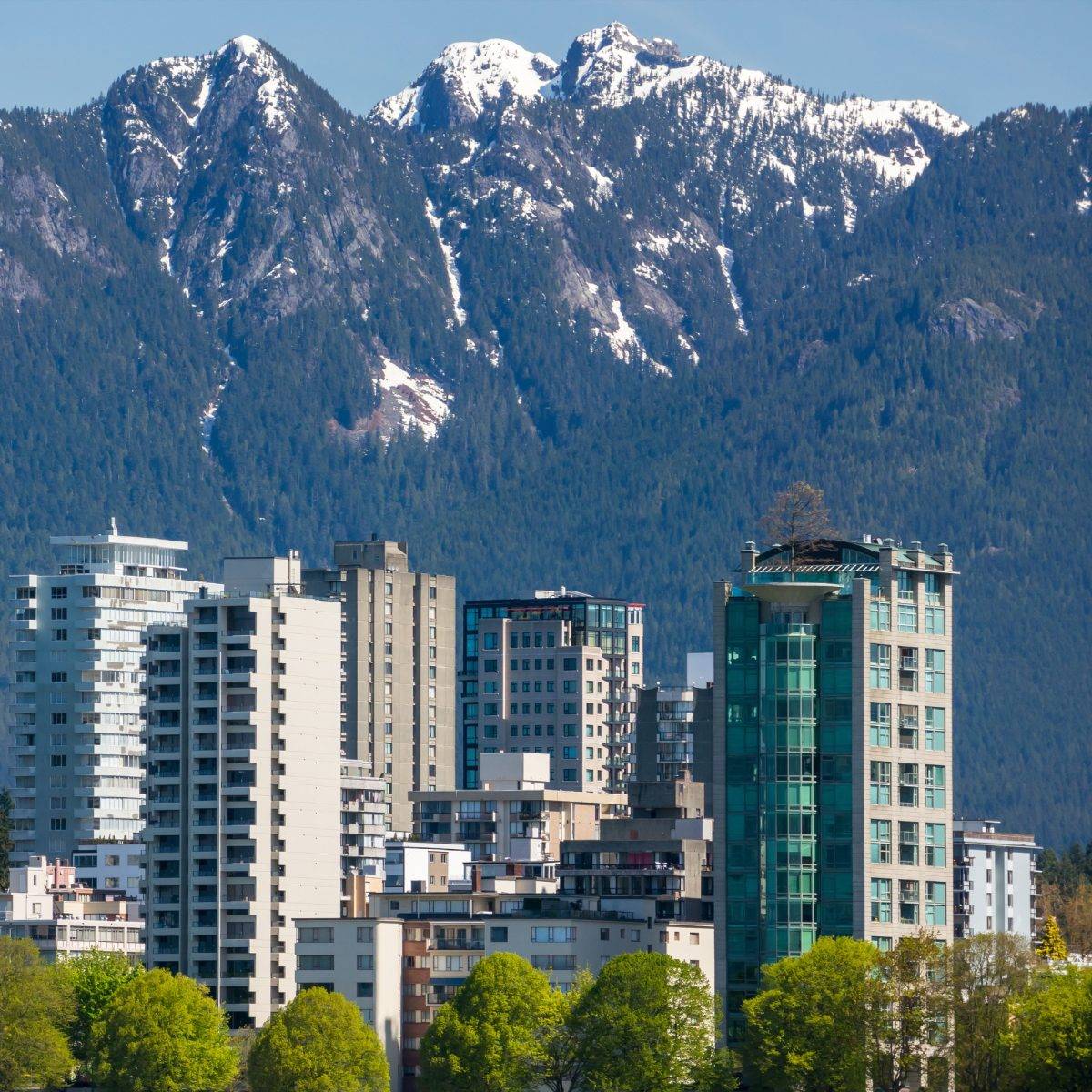 High rise residential building with mountain view in Vancouver during winter