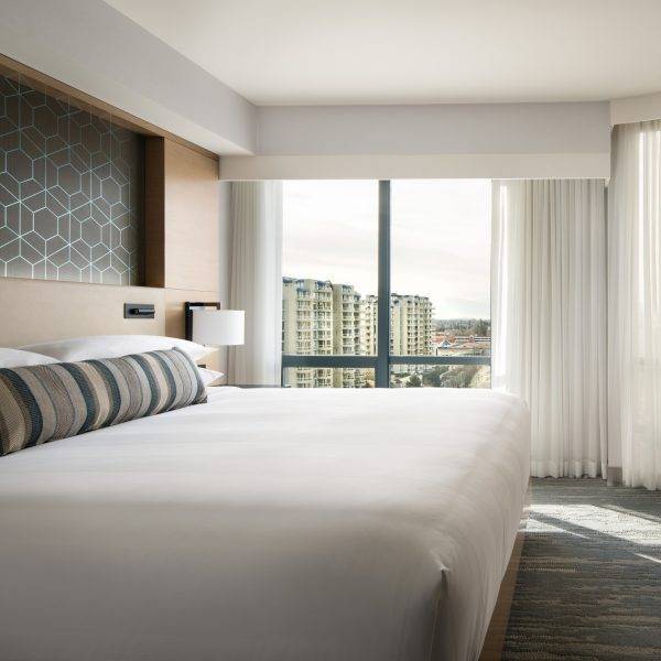 Vancouver Airport Marriott Hotel room with large window and mountain city views